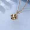 Acero de titanio oro de 18 quilates colgante de dinero moda trébol de cuatro hojas de la suerte diamante niños dama collar para regalo de novia