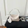 Bolsas de Design de Nicho Transfronteiriças Femininas 2026 Nova Moda Bolsa Transversal Tecida Estilo Coreano de Alta Qualidade Bolsa de Mão Formato Dumpling