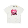 Camiseta de Manga Corta Rosa con Corazón Mismo Estilo Corteiz Hombres Mujeres Streetwear Americano Estampado de Graffiti Bicolor Venta al por Mayor de Fábrica
