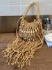 Bolso tejido para mujer, nuevo modelo de verano 2026, bolso de hombro niche y súper popular para el día a día, bolso cruzado con flecos, bolso de playa de paja