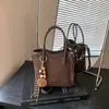 Bolso de hombro de moda transfronterizo para mujer, elegante diseño de bloques de color, bolso tote simple y versátil para el trabajo, retro y casual