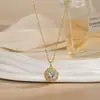 Colar para Mulheres, Flor de Zircônia Bauhinia Giratória da Moda Nicho Moda Novo Design Pingente Titânio Aço Colar de Temperamento