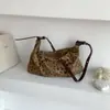 Nova bolsa feminina outono/inverno transfronteiriça, bolsa de bolinho retrô de camurça, grande capacidade, design de nicho, bolsa de ombro com estampa de leopardo, bolsa transversal