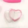 Caja de exhibición de anillos de plástico Caja melocotón Caja de embalaje para joyas Caja de anillo rosa de amor Caja de exhibición de pendientes al por mayor