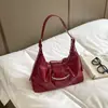 Nuevo bolso de hombro cruzado casual simple de color liso para mujer, bolso exquisito y versátil para la axila, bolsos de mujer al por mayor