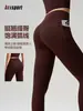 Calças de yoga com sensação de segunda pele para levantar o bumbum com efeito bumbum de pêssego, bolsos, alta elasticidade, sem costura, secagem rápida para corrida e yoga para mulheres atacado