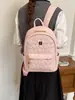 Nova mochila de PU com relevo em formato de coração para estudantes, mochila leve para o dia a dia e viagens, mochila pequena estilosa