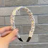 Diadema de tela de primavera con flores pequeñas, plisada, estilo pastoral de celebridad de Internet, pasador para el pelo de niña, diadema simple de comercio exterior