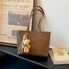 Bolsa Tote Feminina 2026 Novo Estilo Luxo Leve Versátil Grande Capacidade Nicho Feminina Ombro Único Trabalho Bolsa de Axila