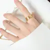 Europa y Estados Unidos popular anillo de moda geométrico chapado en oro para hombre y mujer Joker moderno hip-hop anillo que no se desvanece fabricantes venta al por mayor