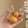 Peça de Mão de Cabaza Natural com Design Versátil, Adequada como Acessório de Bolsa para Homens e Mulheres, um Brinquedo para Alívio do Estresse para Mãos Pequenas