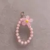 Cadena de teléfono móvil de flor con colgante de cuentas macarrón cuentas de colores llavero creativo cadena para funda de teléfono móvil estilo chica ins