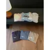 Colección de otoño MZI STUDIO: Estilo coreano, dulce y versátil, adelgazante, de un solo botón, cuello en V con ribete de encaje, suéter cálido A80231