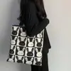 Bolsa de Lona para Mujer Bolso 2025 Nuevo Dibujo Animado Conejo Pintado a Mano Gran Capacidad Bolsa Andy Tienda de Fábrica