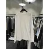 Tug Coréia Dongdaemun 2026 Primavera Nova Camiseta Feminina Gola Redonda Solta Raglan Manga Longa com Escrita nas Costas
