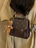 Mochila de Moda de Gama Alta con Bloques de Color para Mujer 2026 Nueva Versátil Casual Mochila de Espalda Multifuncional Pequeña para Viajes Escolares