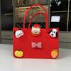 Bolsa de fieltro al por mayor Bola de fieltro Dibujo animado Regalo acompañante Bolso de mano de fieltro Bolsa de compras para llevar a mano Bolsa de regalo logo