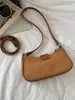 Bolso de mujer de comercio exterior, nuevo modelo otoño 2026, bolso baguette simple y versátil, diseño de moda nicho, bolso de hombro y para debajo del brazo