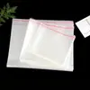 En stock venta al por mayor bolsa de embalaje OPP transparente autoadhesiva bolsa autoadhesiva ropa joyería juguete a prueba de polvo bolsa con película autosellante