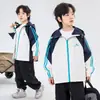 Jaqueta Infantil Primavera 2026 Novo Estilo para Crianças Maiores Camada Única Corta-vento para Exterior Primavera e Outono Jaqueta com Capuz e Zíper