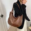 Bolso tote transfronterizo de nuevo estilo minimalista de gran capacidad, cuero suave, diseño relajado, bolso de hombro, venta al por mayor para exportación y uso diario
