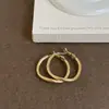 Pendientes de aro geométricos retorcidos de metal liso estilo Ins para mujer, simples, para el trabajo, con temperamento, versátiles, modernos, pendientes de moda, joyería para orejas