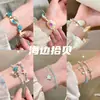 [Isla de Verano] Azul Marino Diseño Versátil de Nicho Pulsera Trenzada de Imitación de Estrella de Mar y Caracola Azul Pulsera Exquisita