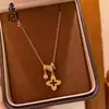 Tienda de Oro Mismo Estilo Collar de Corazón Picado Chapado en Oro Alta Retención de Color Floral Mariposa Moneda de los Cinco Emperadores Collar Venta al por Mayor