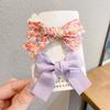 Horquilla con lazo floral, accesorio para el cabello para niños, horquilla estilo coreano para mujer, tocado de celebridades de Internet, pinza con flecos laterales de princesa