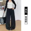Pantalones anchos de lunares negros estilo coreano para mujer, adecuados para primavera y otoño, con caída fluida, cintura con cordón, tiro alto y un estilo relajado y casual con estampado floral