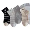 Meias Listradas de Trevo de Quatro Folhas Vazadas Estilo Coreano de Verão para Mulheres, Estilo Fino Respirável, Meias Curtas de Fio de Ponto com Filhote de Cachorro Desenho Animado Ins