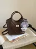 Bolso bandolera nuevo y moderno para ir al trabajo, bolso de mano, bolso de moda, bolso tipo cubo de primavera, bolso sencillo para mujer, diseño exclusivo acolchado