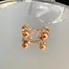 Pendientes de Perla de Circonita de Moda de Aguja Plateada Pendientes de Botón Retro de Lujo Ligero de Nicho Francés Pendientes Nuevos 2026