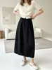 Saia em botão tridimensional estilo Hepburn original! Tecido de lã europeu outono e inverno saia longa elegante