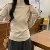 Suéter de color sólido simple con cuello alto pequeño para mujer, otoño e invierno 2026, terciopelo alemán suave y acogedor, hombro normal, top básico versátil