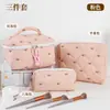 Bolsa de maquiagem acolchoada com laço, nova, transfronteiriça, portátil para viagem, grande capacidade, necessaire, bolsa multifuncional para armazenamento de batom