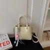 Nueva colección de primavera: bolso cubo de diseño exclusivo para mujer, bolso de hombro moderno y casual, bolso de mano moderno y único para 2026