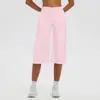 Nuevos shorts de yoga de estilo europeo y americano, con un color cremoso, cintura alta, efecto adelgazante, control de abdomen y un diseño casual y deportivo, perfectos para fitness y yoga.