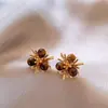 Pendientes de Ojo de Tigre Maillard Otoño e Invierno para Mujer, Pendientes de Botón Elegantes con un Toque de Lujo, Lujo Ligero, Nuevos Accesorios Populares para Orejas 2026