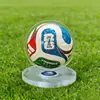 Mercancía 2026: Regalos premium, exhibidor giratorio de fútbol, transfronterizo, Brasil, EE. UU., Canadá, México, recuerdos, soporte de exhibición de la Copa del Mundo