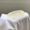 Venta al por mayor del fabricante Pulsera de Jade Natural Color Champagne Dorado Tipo Hielo Alto para Mujer Pulsera de Roca de Jadeíta Espuma de Agua Venta al por Mayor en Transmisión en Vivo