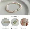 Pulsera de Jade Hetian Natural Estilo Nicho Elegante de Gama Alta para Mujer Estilo Chino Lujo Accesible Pulsera de Perlas Fuertes