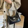 Bolso bandolera, bolso de hombro único para el trabajo, moda de otoño 2026, bolso popular para mujer, nuevo estilo de cadena tipo aceite y cera, bolso versátil para llevar debajo del brazo