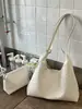 Bolsa de ombro retrô Shuai Mi Jia para mulheres 2026 nova moda trançada grande capacidade simples elegante bolsa de mão bolsa tote