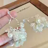 Pendientes de Borla con Forma de Pétalo de Concha Estilo Francés para Mujer 2026 Verano Lujo Ligero Diseño de Gama Alta Pendientes