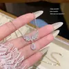 Collar Gargantilla de Ala de Ángel de Lujo Ligero de Alta Gama Europeo y Americano con Colgante de Gota de Agua Rosa y Borla para Mujer, Simple y a la Moda