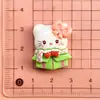 Caja de regalo de Navidad de dibujos animados Sanrio Diversión para niños material de paquete de accesorios de resina para funda de teléfono pasador diy hecho a mano pegamento de crema