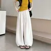 Pantalones de pierna ancha finos de moda versátiles para principios de otoño con cordón cintura elástica pantalones simples de cintura alta adelgazantes pantalones curvos pantalones casuales para mujer