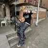 Jeans de trabajo de nicho con diseño retro americano para hombres y mujeres, nuevo estilo de verano, pantalones rectos holgados y versátiles para la calle