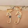 Pendientes de Cobre Chapado en Oro de 18 Quilates, Novedad Creativa Personalizada del Distrito de Lu, con Zirconita, Modelo de Caballito de Mar, Pendientes para Mujer, Venta al por Mayor